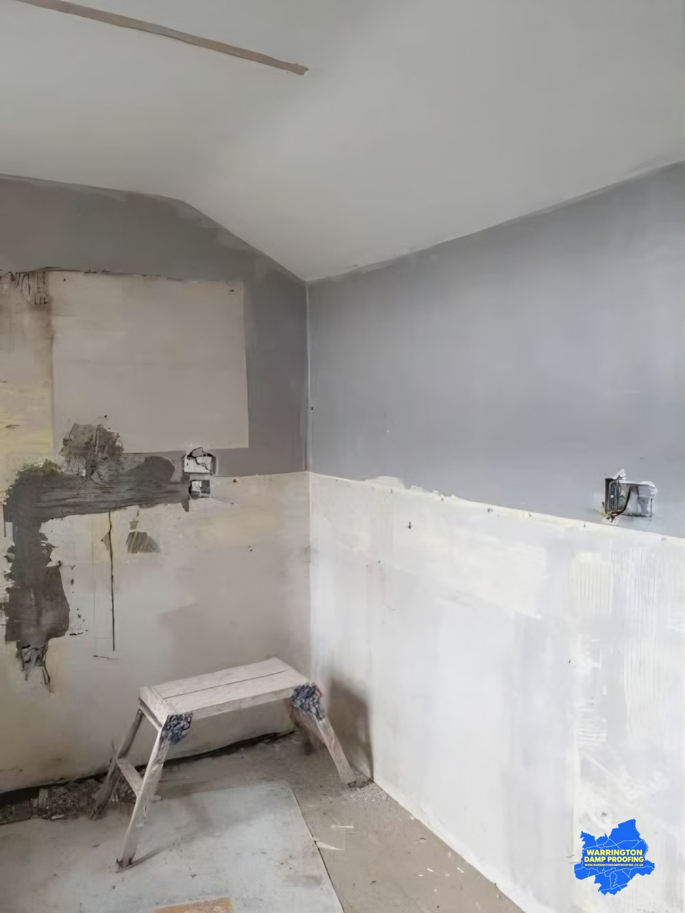 Damp wall before treatment